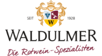 Logo von Waldulmer mit Wappen, Rebstock und Schriftzug 'Die Rotwein-Spezialisten', 'W' in Gelb, seit 1928.